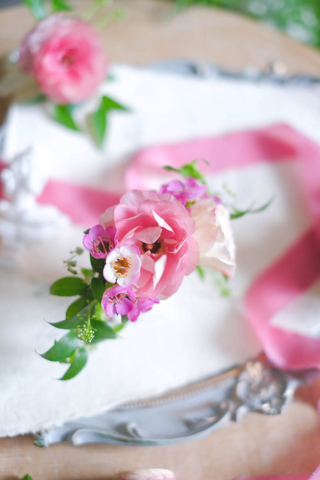Soft pink ranunculus wedding boutonniere. Romantic blush wedding boutonniere