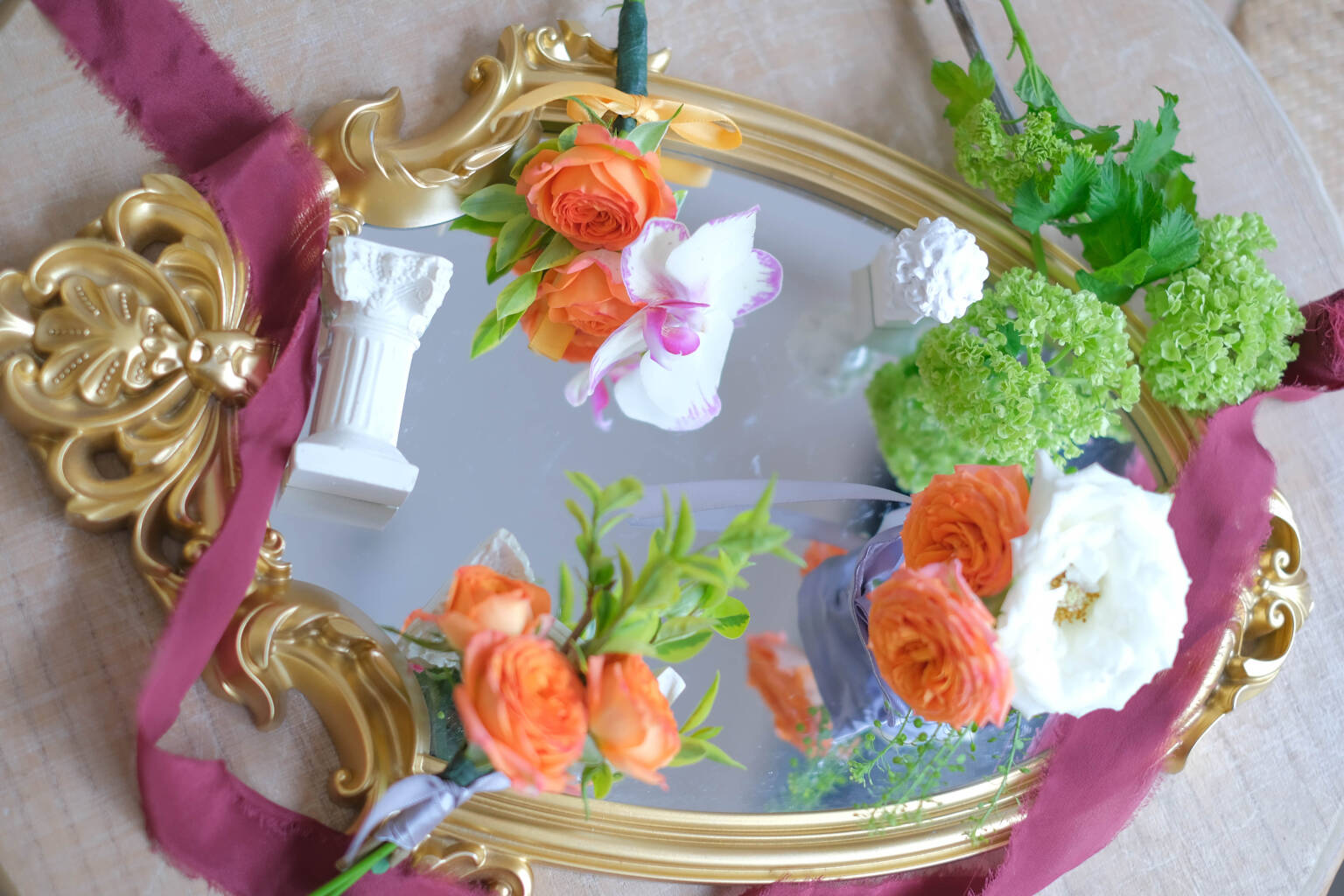 Orange wedding boutonniere 