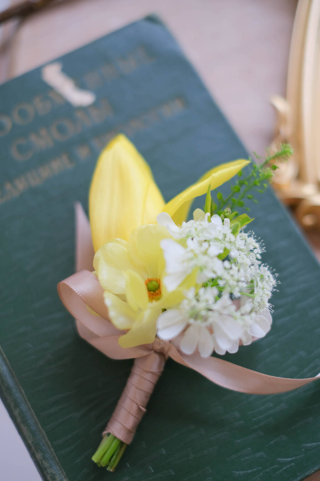Yellow calla lily wedding boutonniere