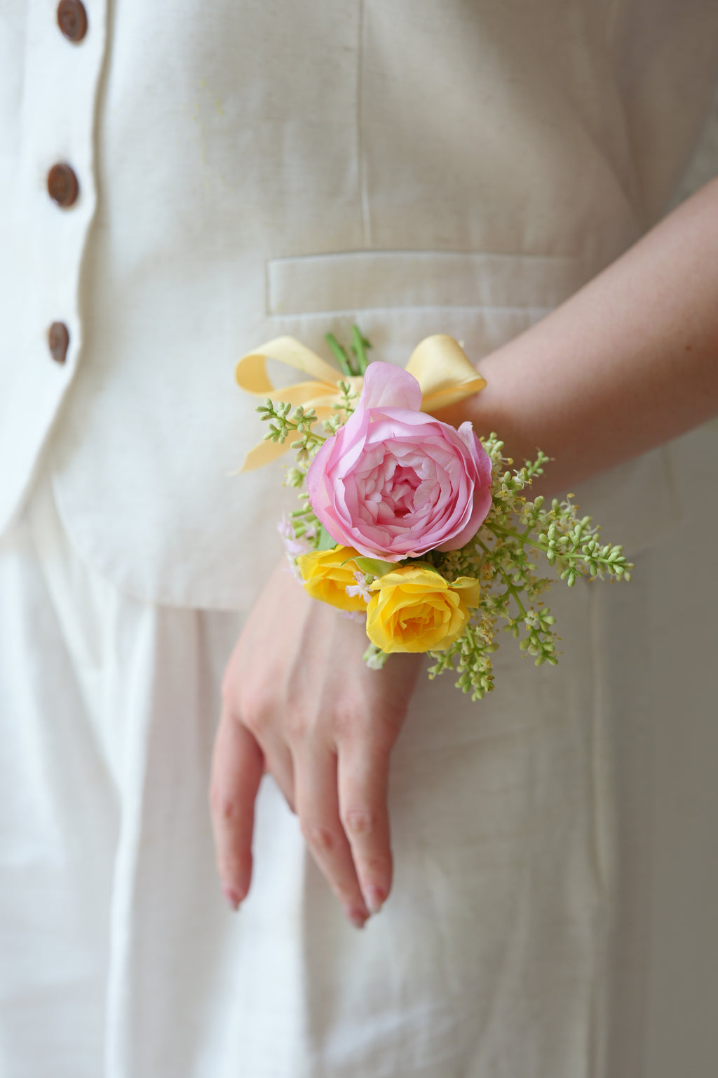 Pink Ranunculus and Yellow Spray Roses Wrist Corsage | Bay Area Wedding Flowers