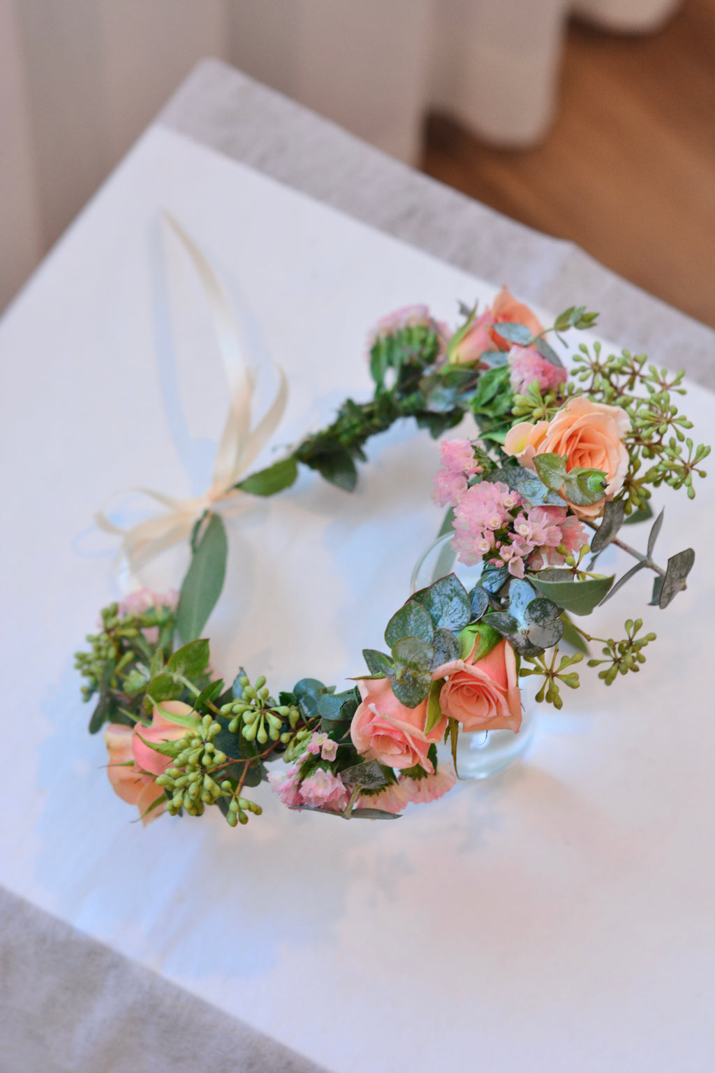 Garden Style Fresh Flower Crown with light orange and greenery for weddings and special events. Bay Area Florist.