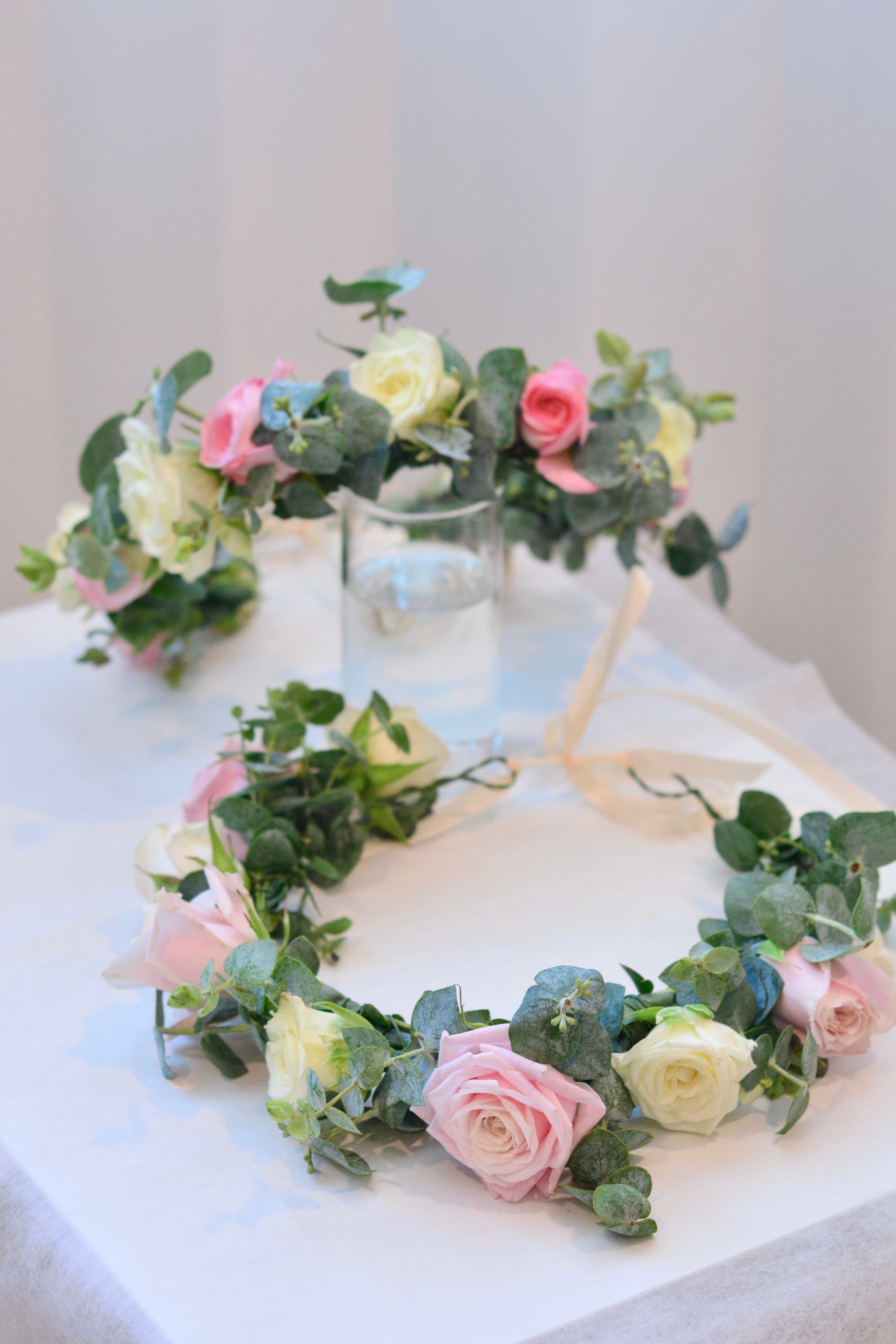 Garden style fresh flower crown with light pink and white spray roses and greenery for weddings and special events. Bay area florist